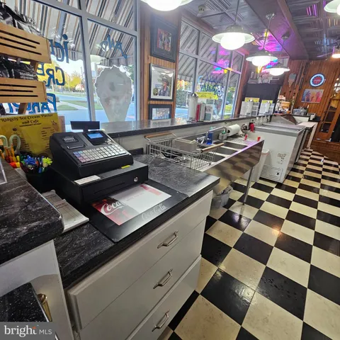 a kitchen with lots of appliances and cabinets