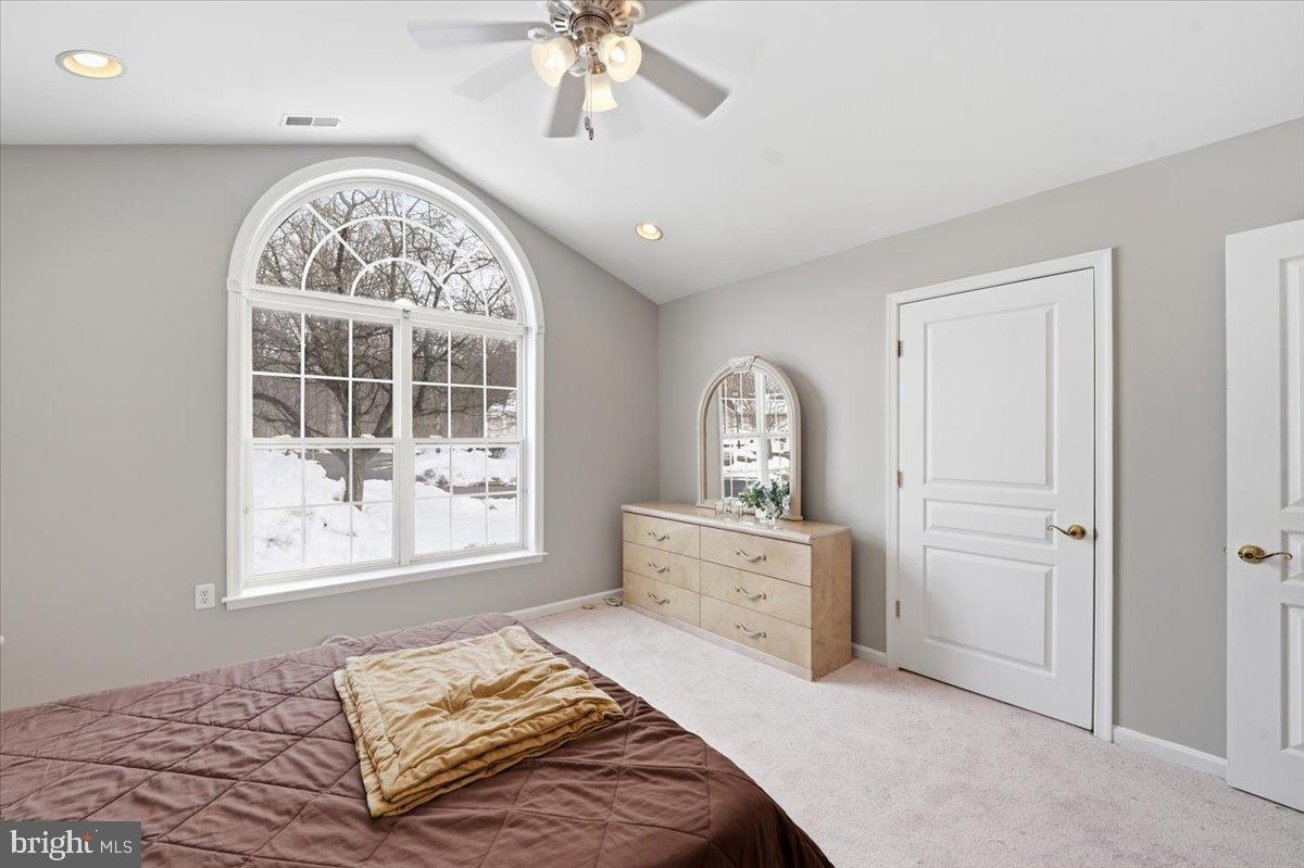 192 Federal Point Boulevard Lawrenceville, NJ 08648 - Photo 18 of 34 a bedroom with a bed and a window