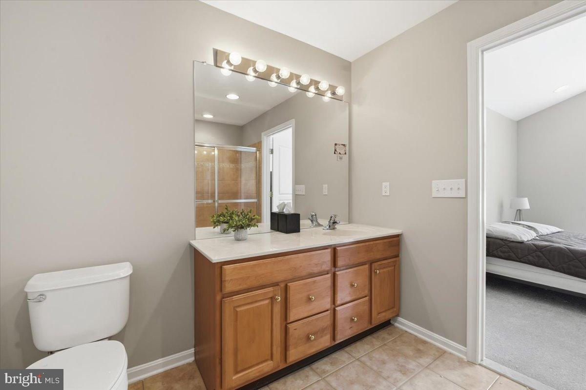 192 Federal Point Boulevard Lawrenceville, NJ 08648 - Photo 21 of 34 a spacious bathroom with a toilet sink and mirror