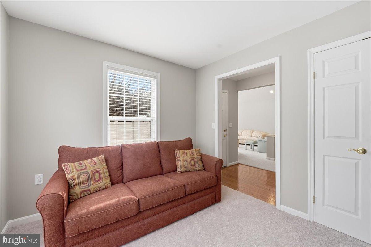 192 Federal Point Boulevard Lawrenceville, NJ 08648 - Photo 24 of 34 a living room with furniture and a window