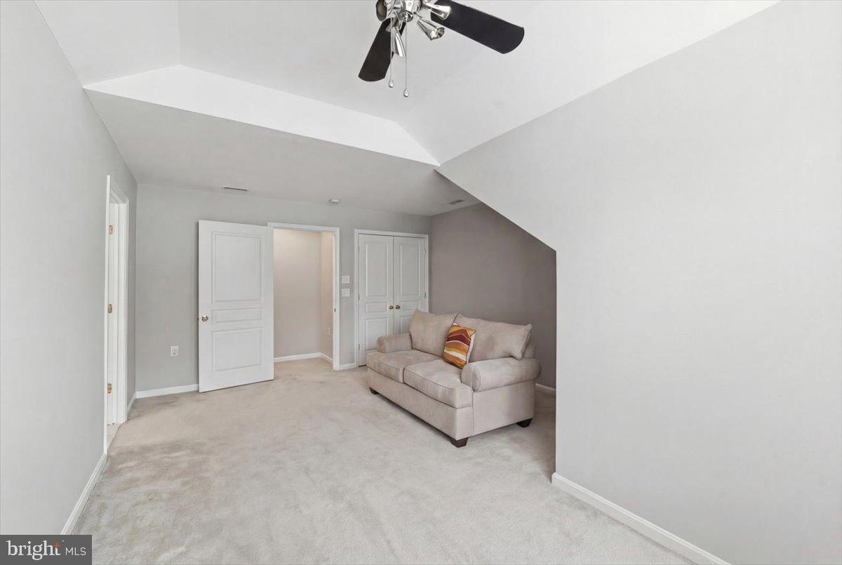 192 Federal Point Boulevard Lawrenceville, NJ 08648 - Photo 26 of 34 a living room with furniture and a ceiling fan