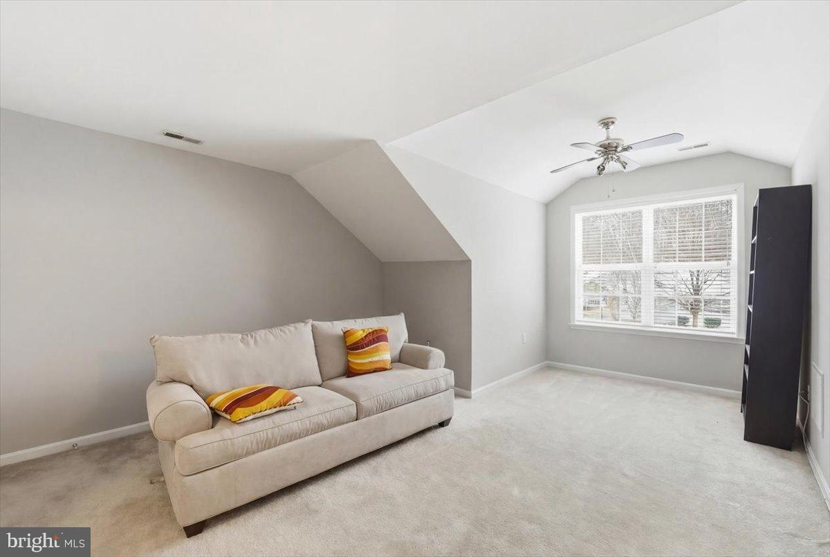 192 Federal Point Boulevard Lawrenceville, NJ 08648 - Photo 28 of 34 a living room with furniture and a window