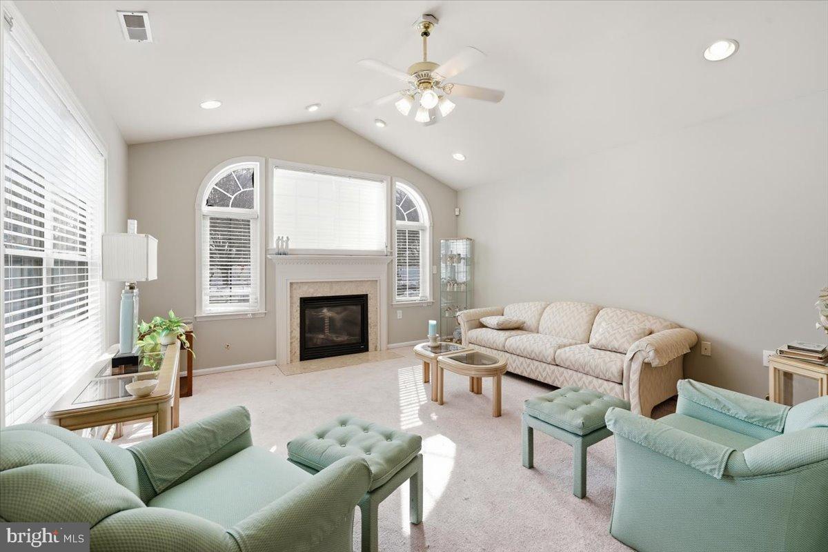 192 Federal Point Boulevard Lawrenceville, NJ 08648 - Photo 5 of 34 a living room with furniture and a fireplace