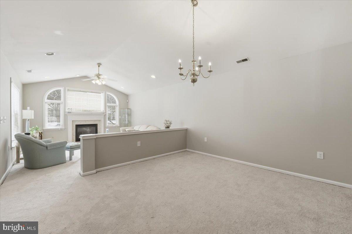 192 Federal Point Boulevard Lawrenceville, NJ 08648 - Photo 8 of 34 a living room with furniture and a fireplace