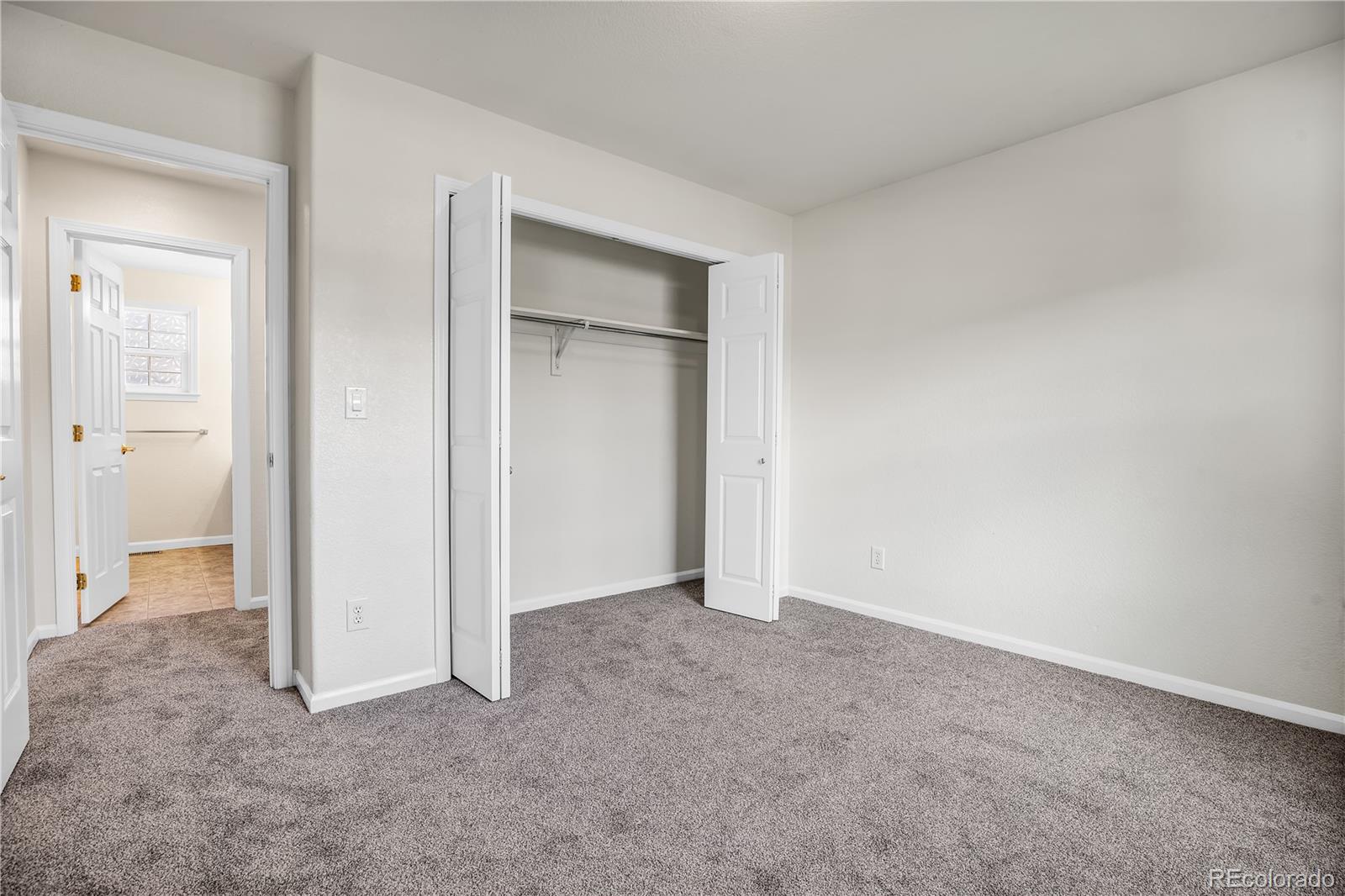 4505 Simms Court Wheat Ridge, CO 80033 - Photo 26 of 37 a view of an empty room and closet area
