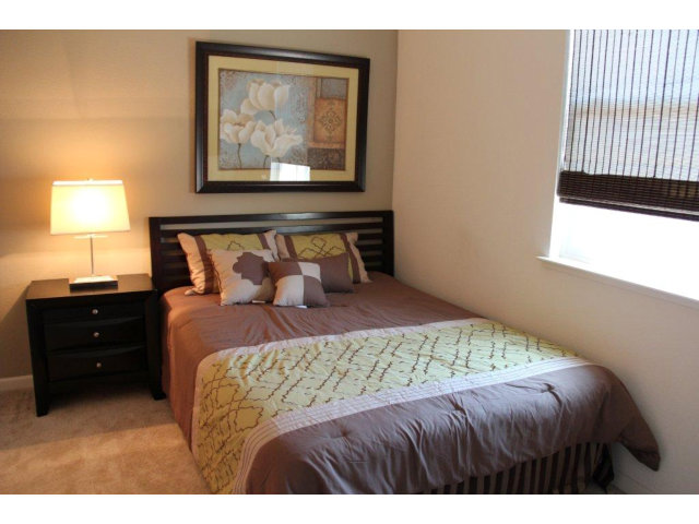 69 Ede Lane Milpitas, CA 95035 - Photo 11 of 17 a bedroom with a bed and a window