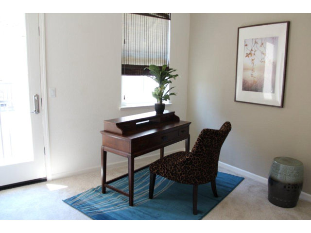 69 Ede Lane Milpitas, CA 95035 - Photo 6 of 17 a living room with furniture and a potted plant