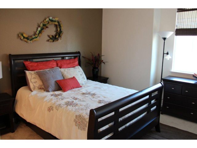 69 Ede Lane Milpitas, CA 95035 - Photo 7 of 17 a bed sitting in a bedroom next to a window