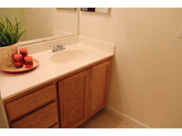 69 Ede Lane Milpitas, CA 95035 - Photo 8 of 17 a bathroom with a sink and a mirror