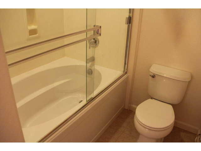 69 Ede Lane Milpitas, CA 95035 - Photo 9 of 17 a bathroom with a toilet and a shower