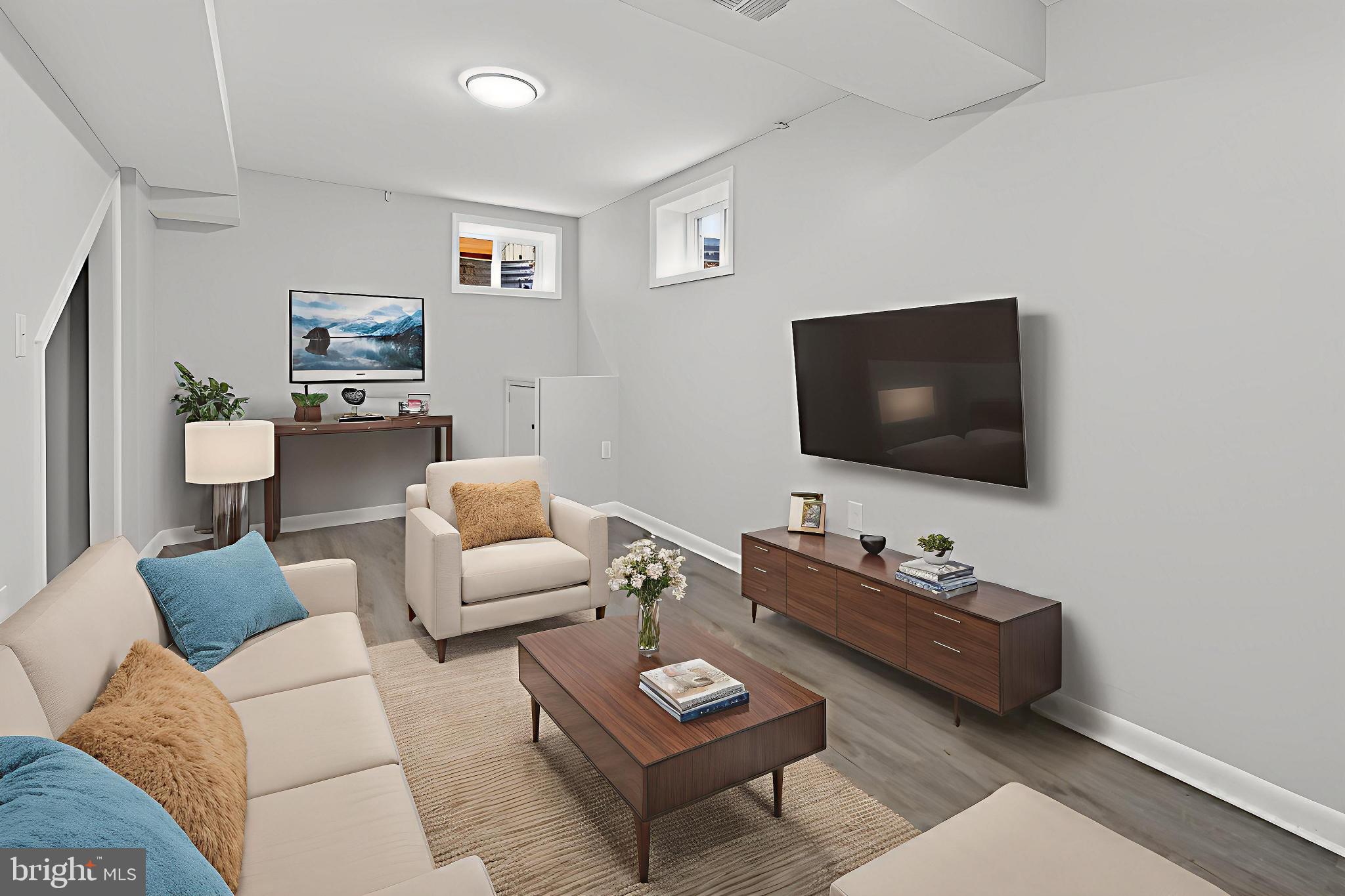 3505 N Street Southeast Washington, DC 20019 - Photo 17 of 29 a living room with furniture and a flat screen tv