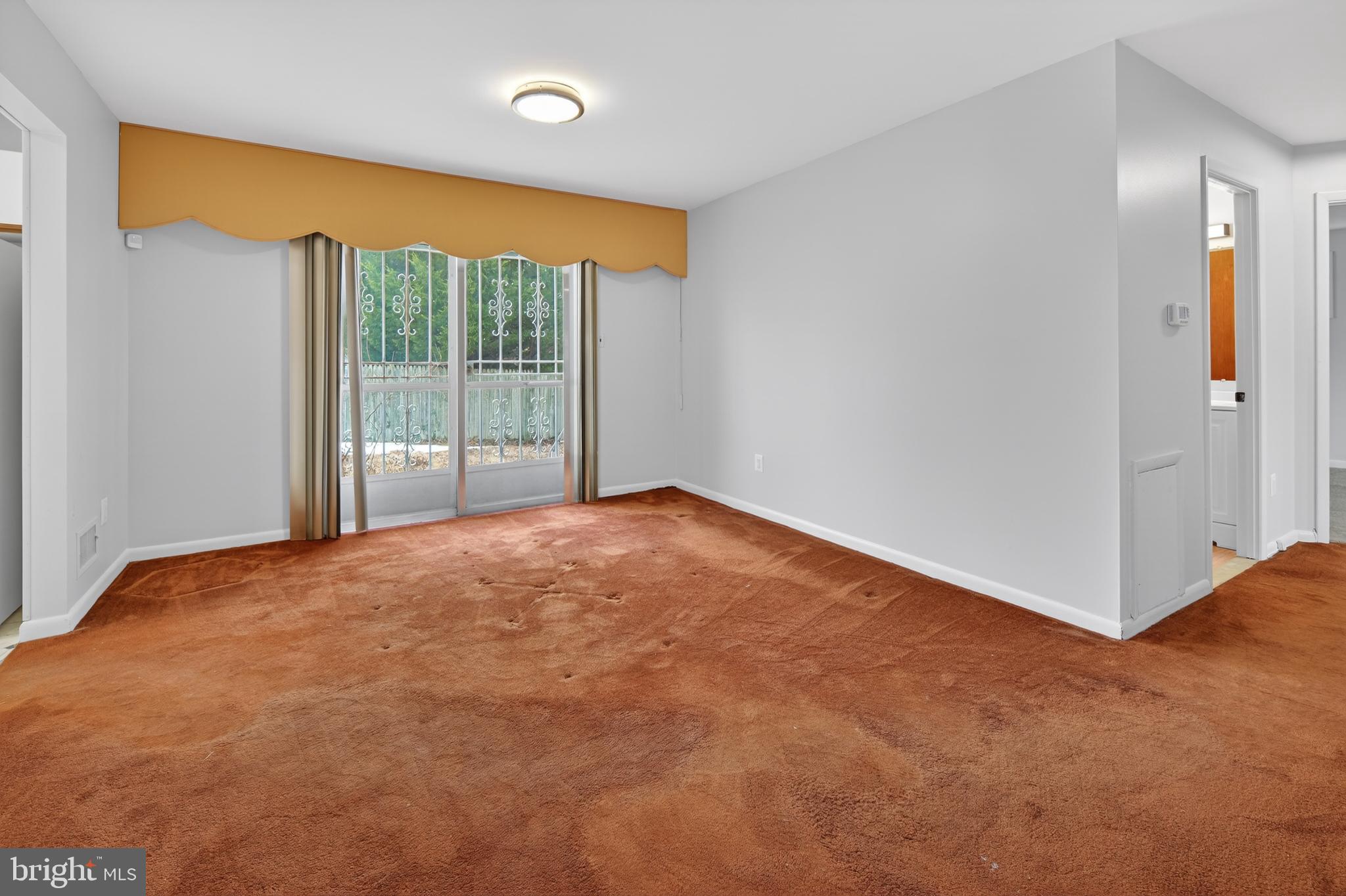 3505 N Street Southeast Washington, DC 20019 - Photo 4 of 29 a view of an empty room with a window