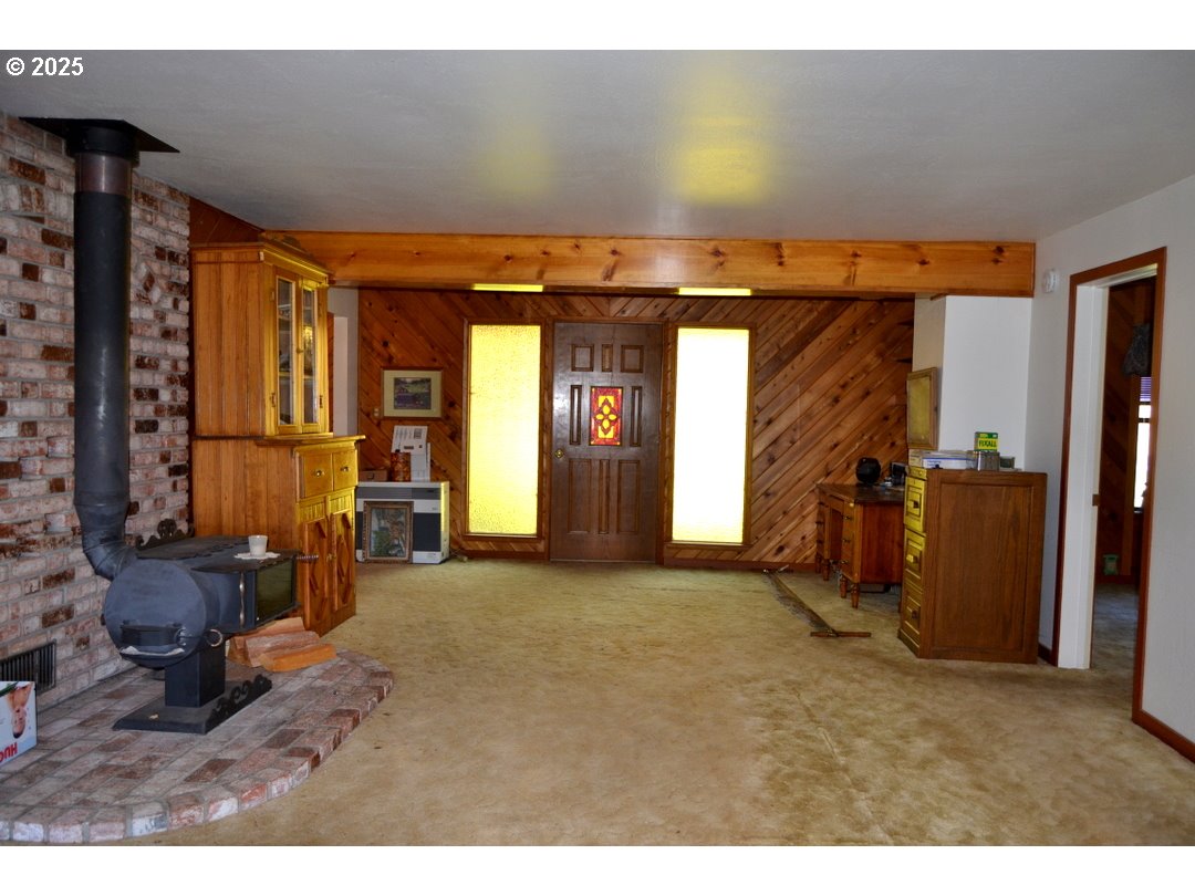6181 Lower River Road Grants Pass, OR 97526 - Photo 18 of 37 a view of a livingroom with furniture and a window