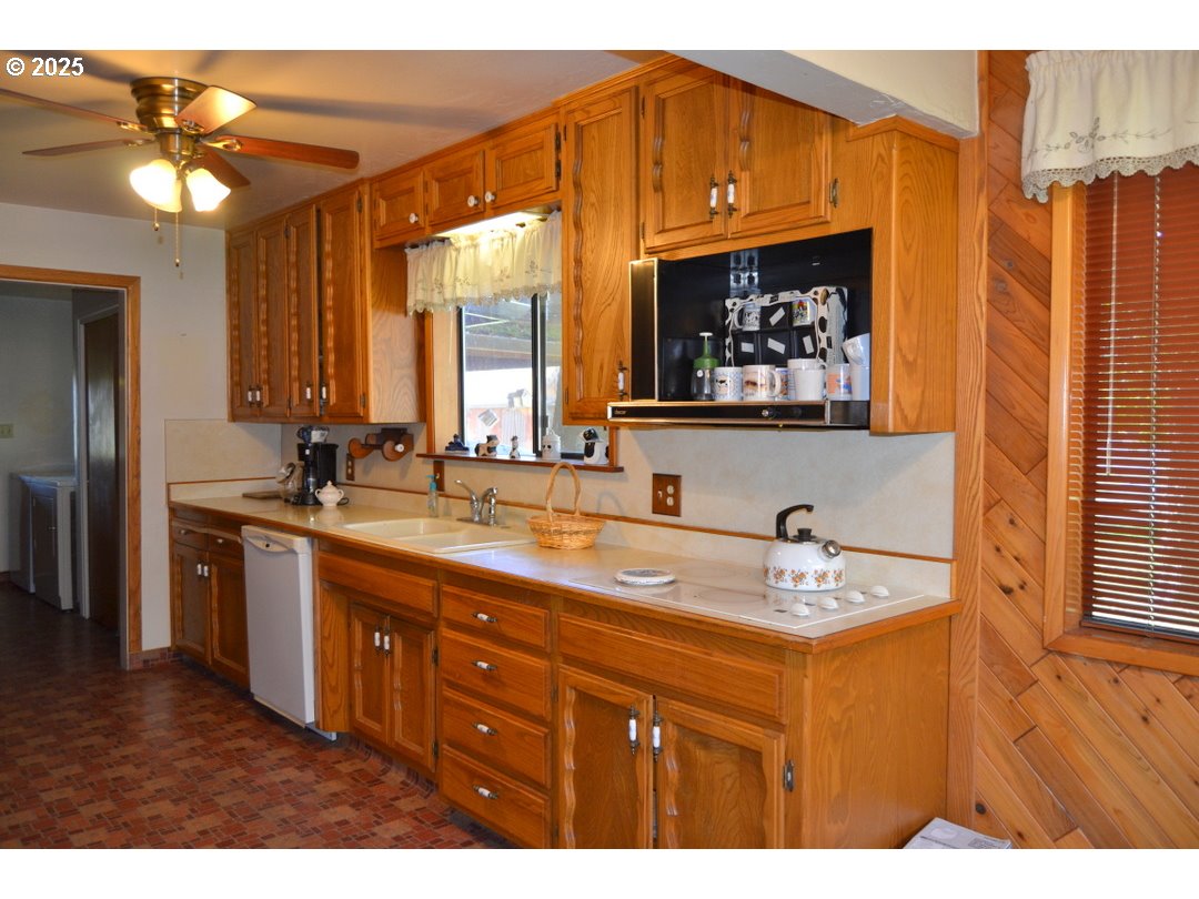 6181 Lower River Road Grants Pass, OR 97526 - Photo 6 of 37 a bathroom with a sink and a mirror