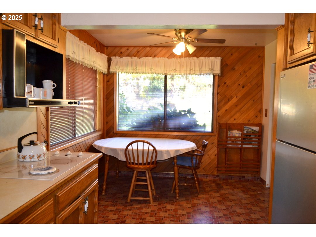 6181 Lower River Road Grants Pass, OR 97526 - Photo 7 of 37 a view of a dining room with furniture window and outside view