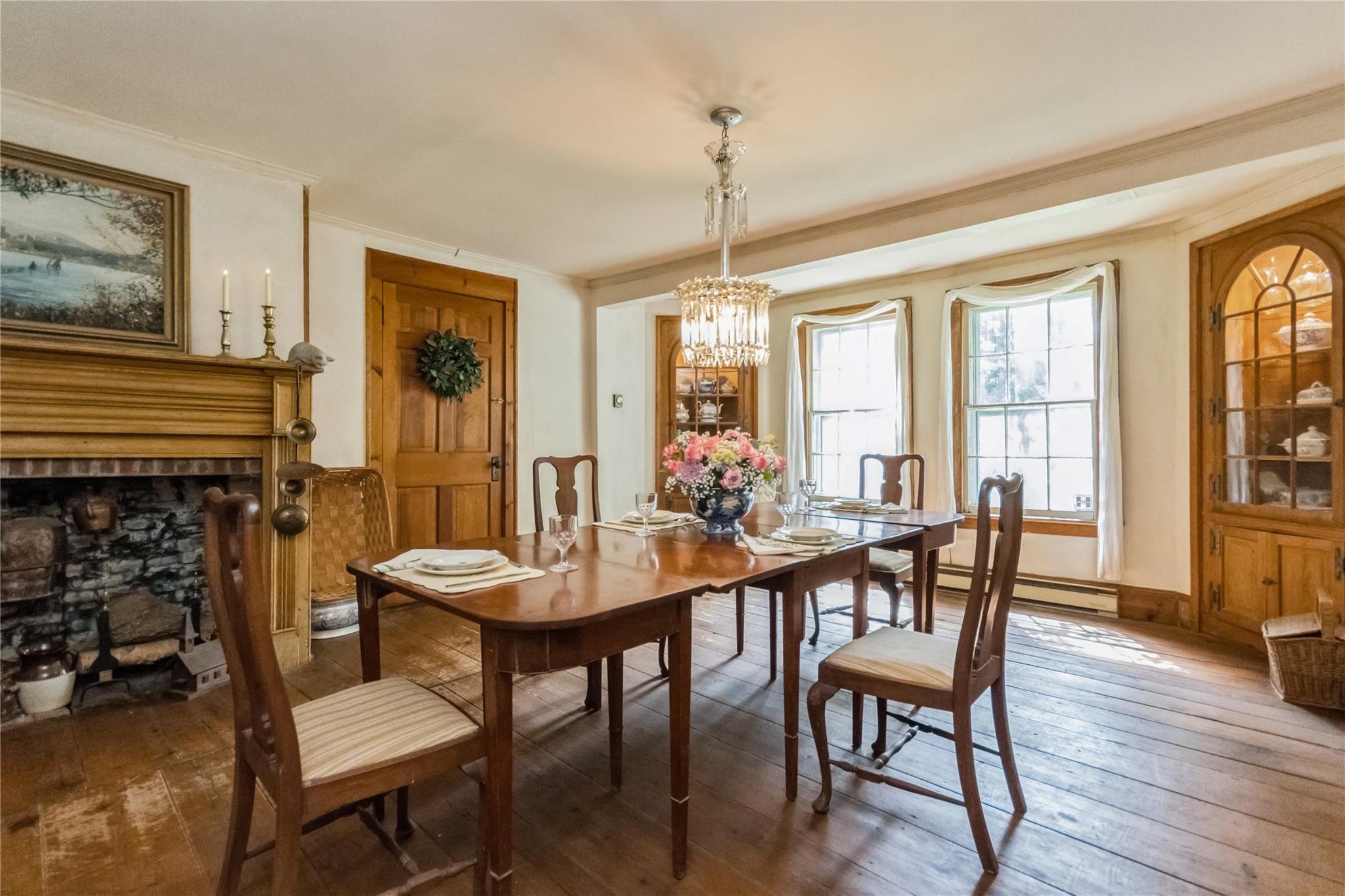 93 Widmer Road Wappingers Falls, NY 12590 - Photo 11 of 45 a view of a dining room with furniture window and wooden floor