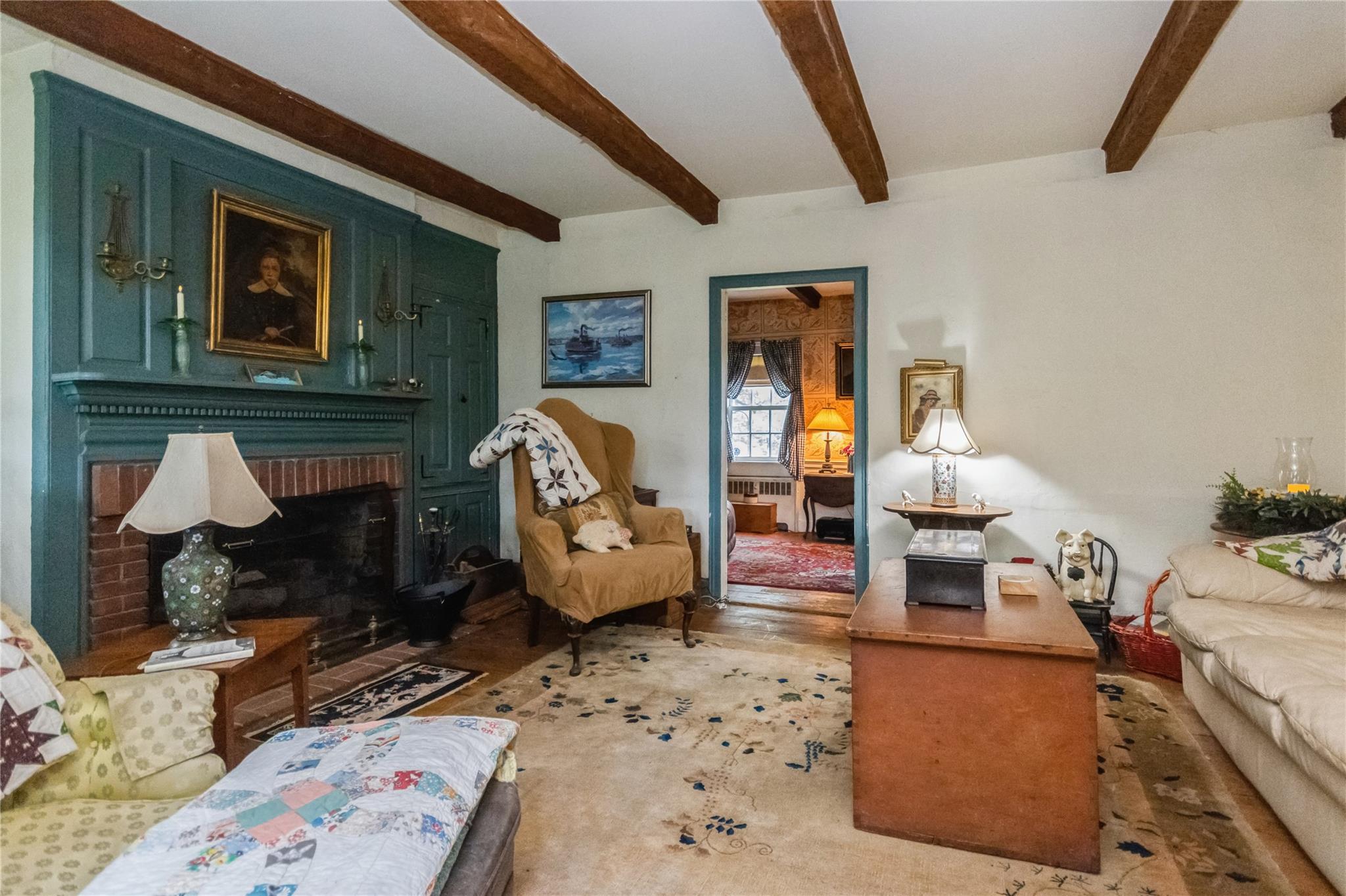 93 Widmer Road Wappingers Falls, NY 12590 - Photo 17 of 45 a living room with furniture and a fireplace