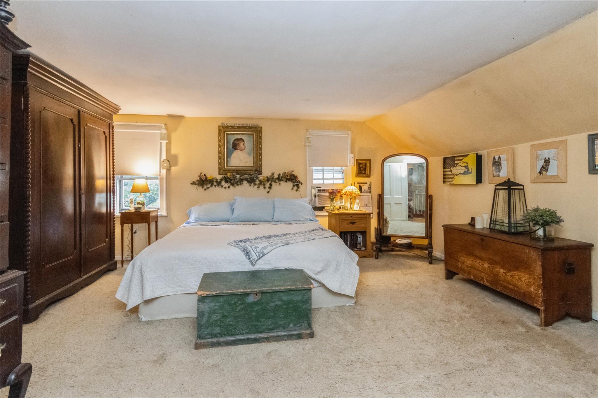 93 Widmer Road Wappingers Falls, NY 12590 - Photo 29 of 45 a spacious bedroom with a bed and dresser