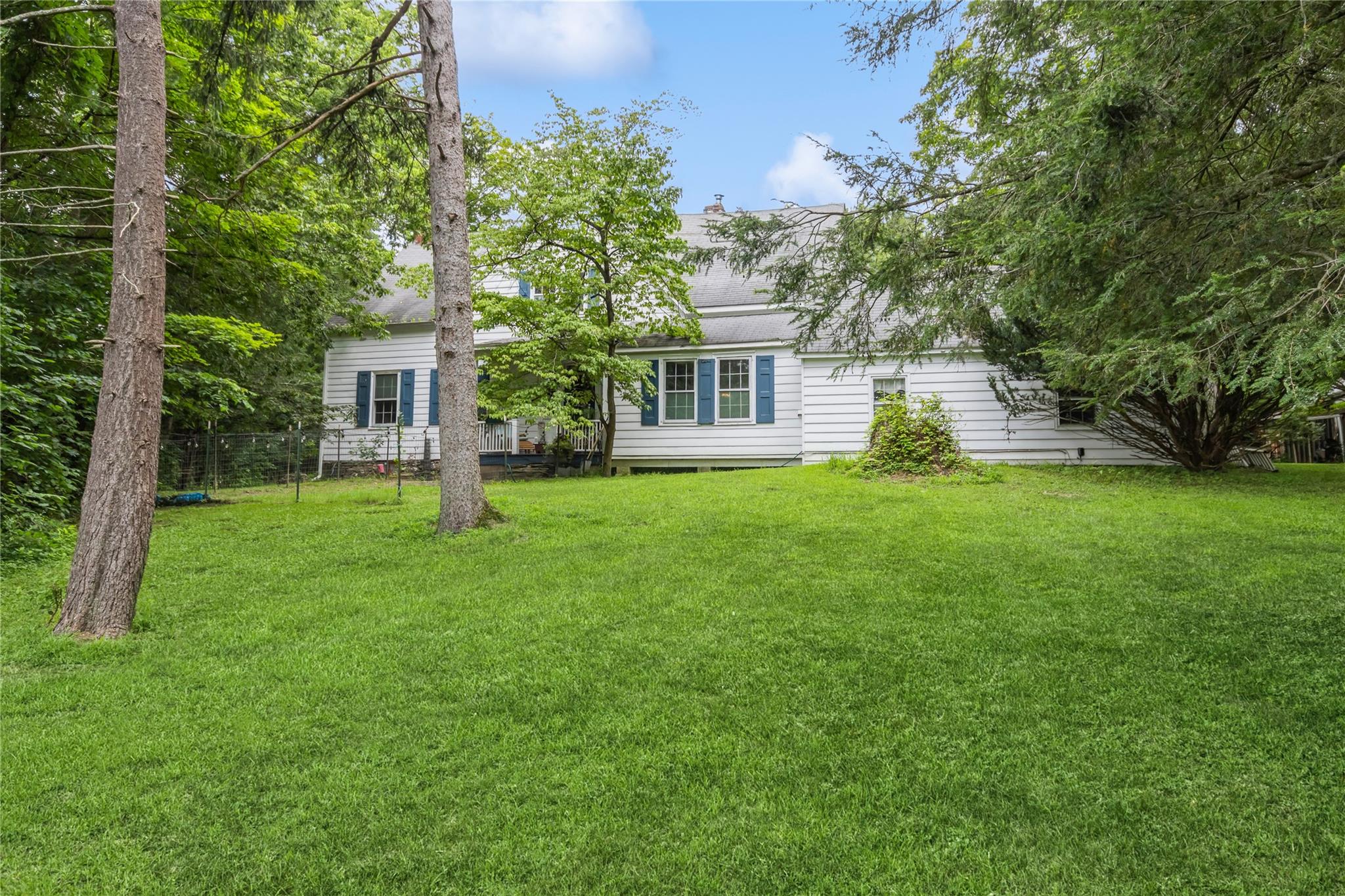 93 Widmer Road Wappingers Falls, NY 12590 - Photo 4 of 45 a view of a house with a yard and sitting area