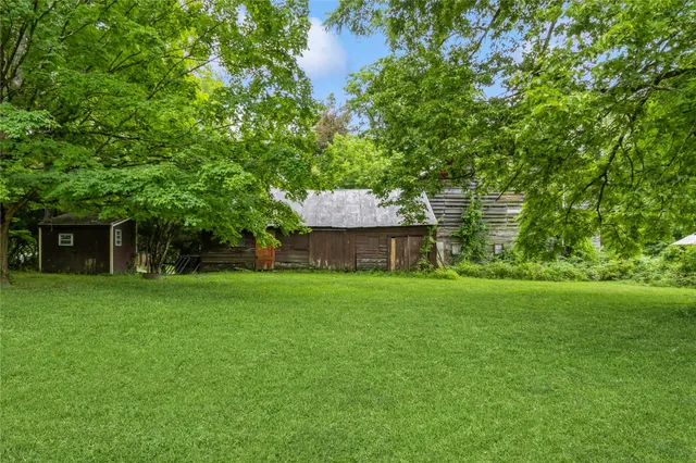 a fire hydrant in the middle of a field