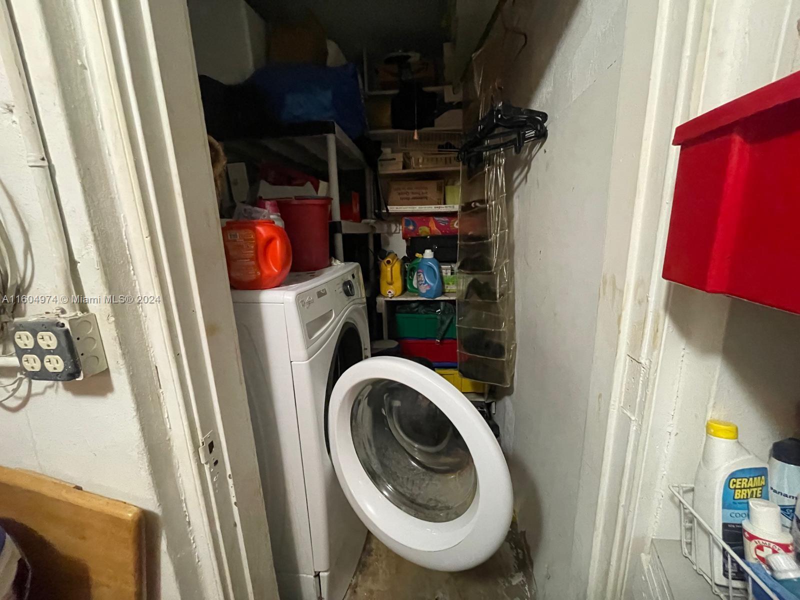 Pompano Beach Pompano Beach, FL 33064 - Photo 12 of 17 a view of walk in closet with clothes and shoes