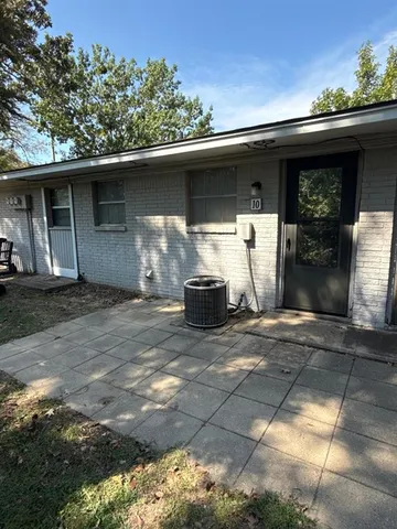 a view of a swimming pool with back yard