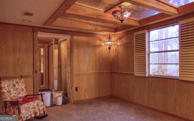 a view of walk in closet with furniture