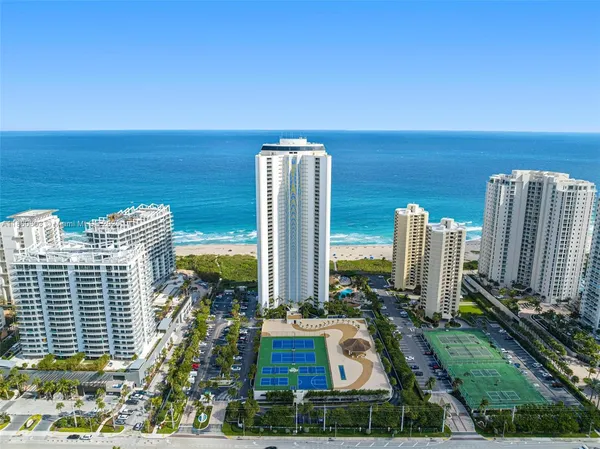 a view of a city with tall buildings