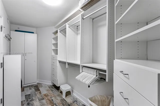 a view of kitchen with furniture and a window