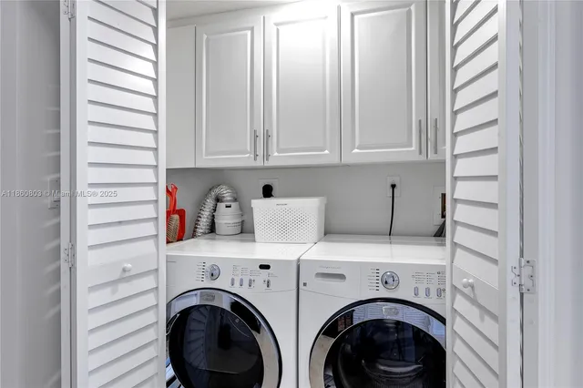 a view of a room with furniture and a floor to ceiling window