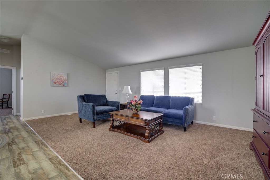 3700 Buchanan, Unit 25 Corona, CA 92503 - Photo 11 of 27 a living room with furniture and a window