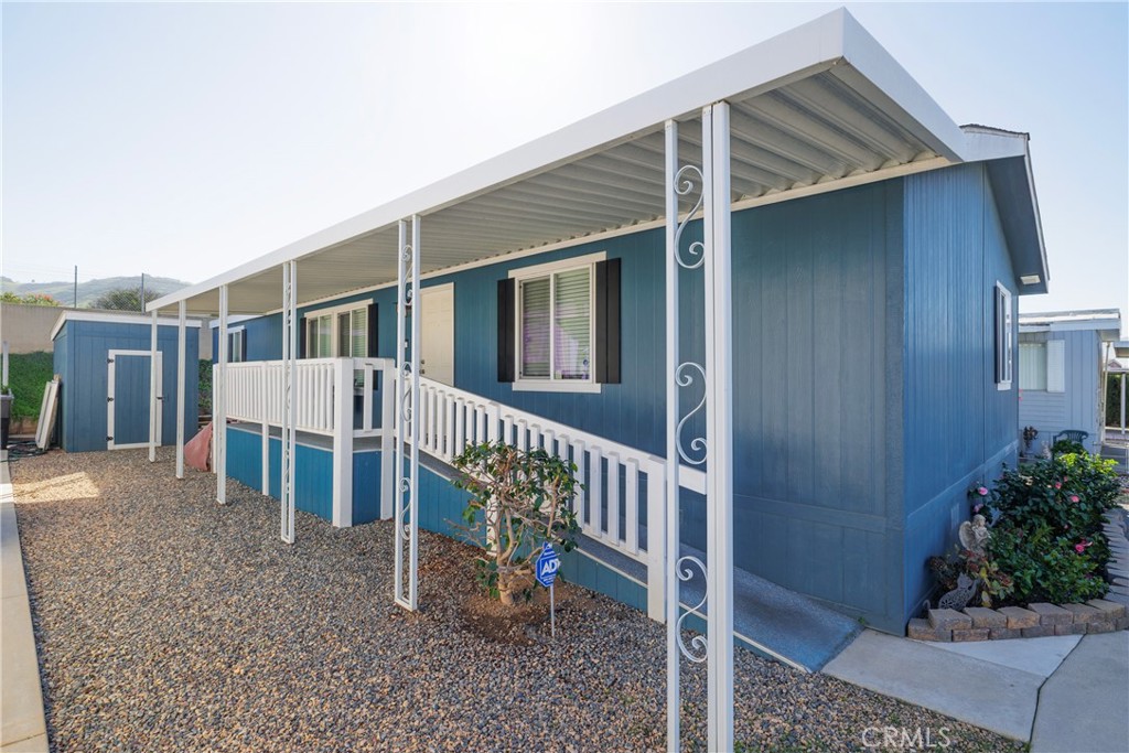 3700 Buchanan, Unit 25 Corona, CA 92503 - Photo 5 of 27 a view of a house with backyard and porch