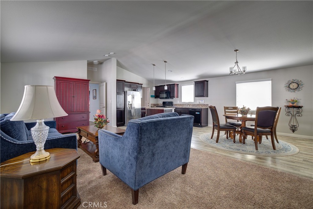 3700 Buchanan, Unit 25 Corona, CA 92503 - Photo 9 of 27 a living room with furniture and a window
