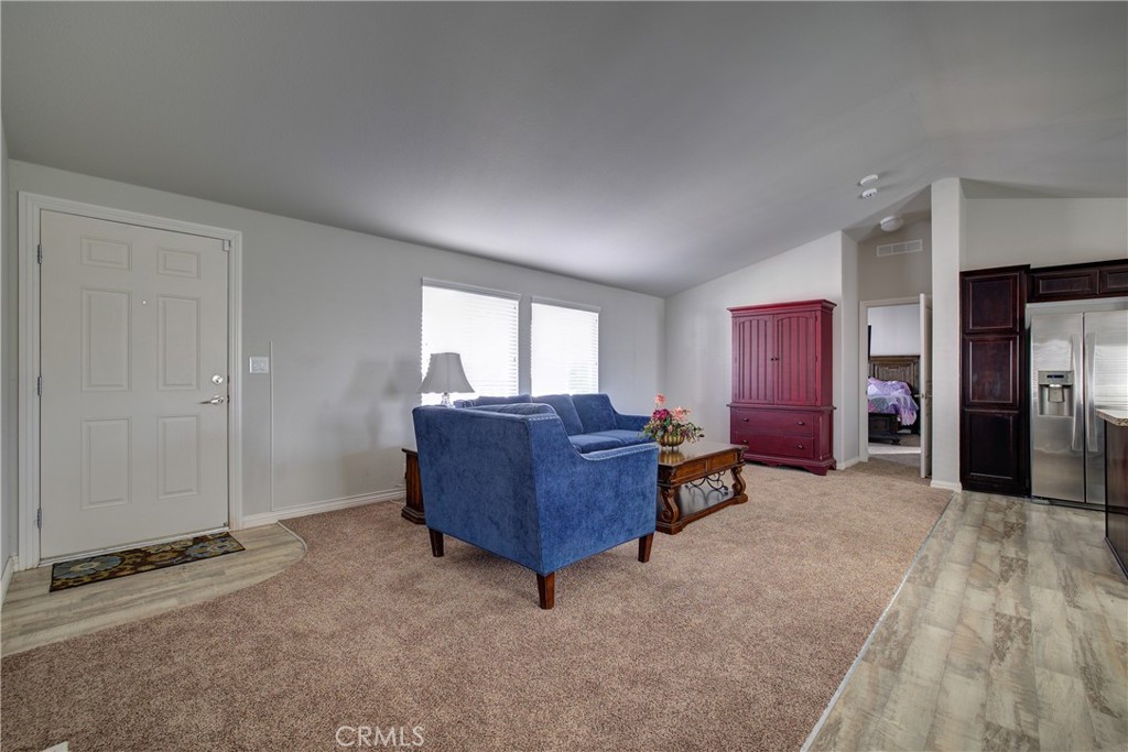 3700 Buchanan, Unit 25 Corona, CA 92503 - Photo 10 of 27 a living room with furniture and a window