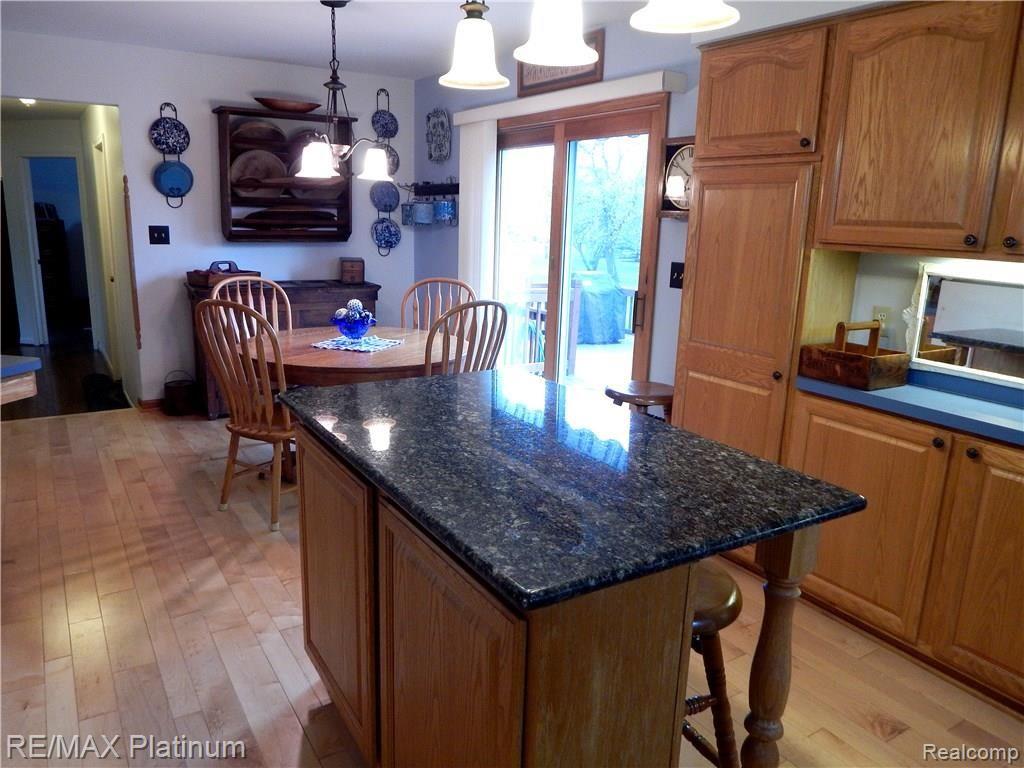 86 South Burkhart Road Howell, MI 48843 - Photo 14 of 52 Granite Island with Seating and Storage!