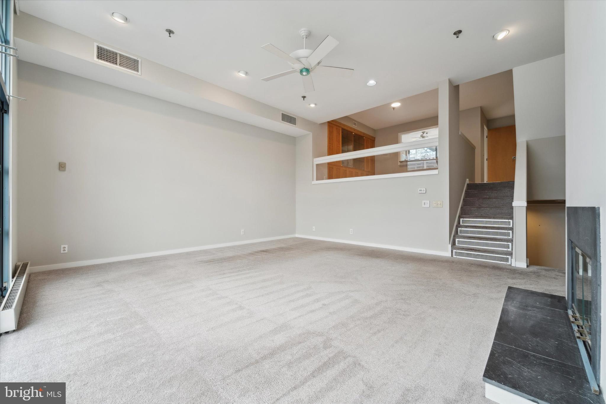 7 North Christopher Columbus Boulevard, Unit 130 Philadelphia, PA 19106 - Photo 7 of 44 Living room looking towards dining and kitchen