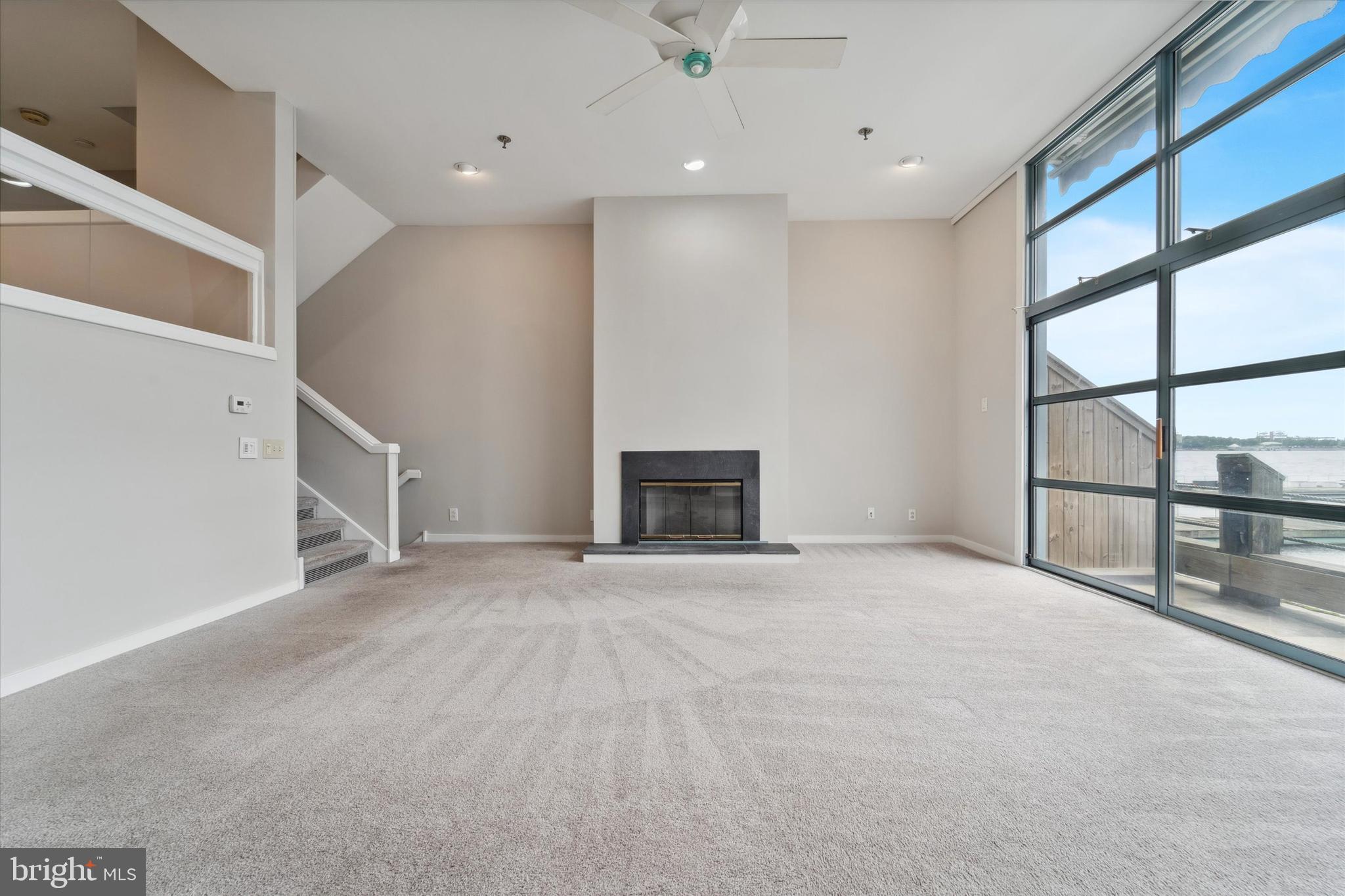 7 North Christopher Columbus Boulevard, Unit 130 Philadelphia, PA 19106 - Photo 8 of 44 Living room fireplace