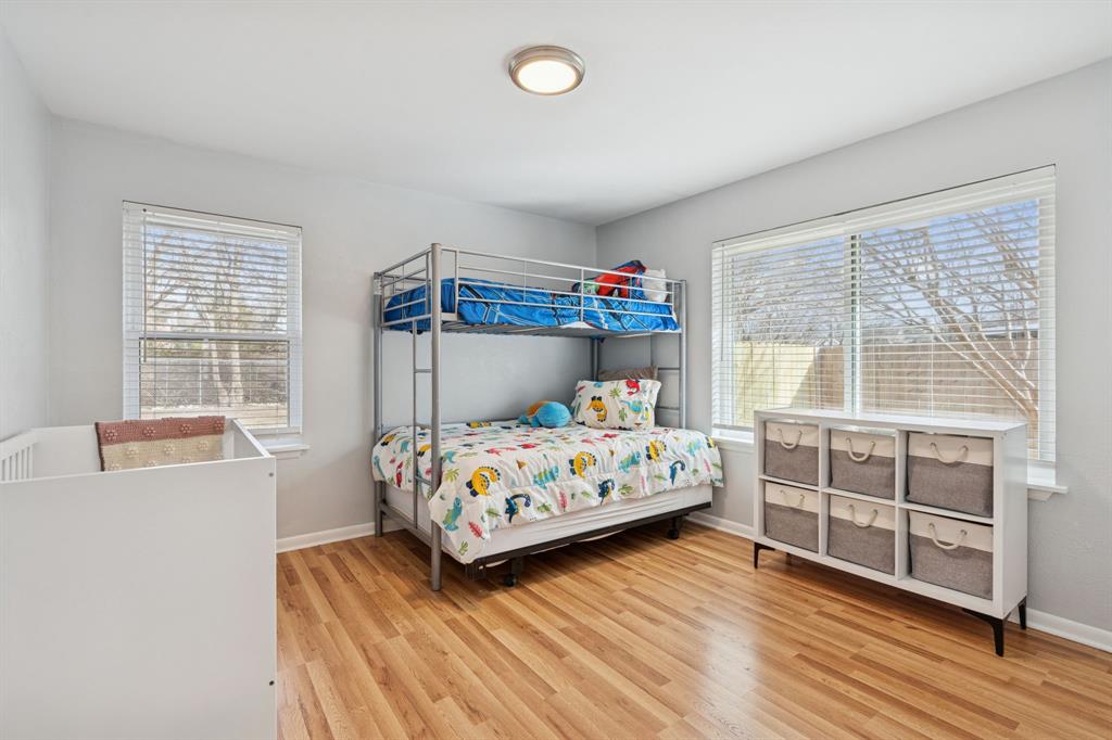 4001 Willow Bend Road Benbrook, TX 76116 - Photo 24 of 29 a bedroom with a bed and a window