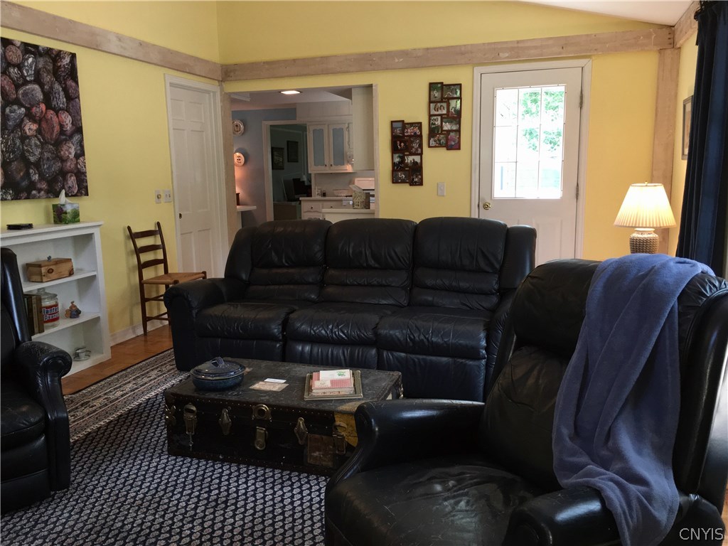 130 Pine Ridge Road Manlius, NY 13066 - Photo 16 of 35 Family room has rear door to a wrap-around deck- t