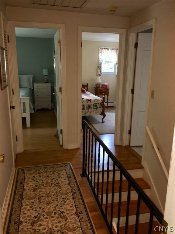 130 Pine Ridge Road Manlius, NY 13066 - Photo 19 of 35 Hardwood flooring in hallway and all 3 bedrooms.