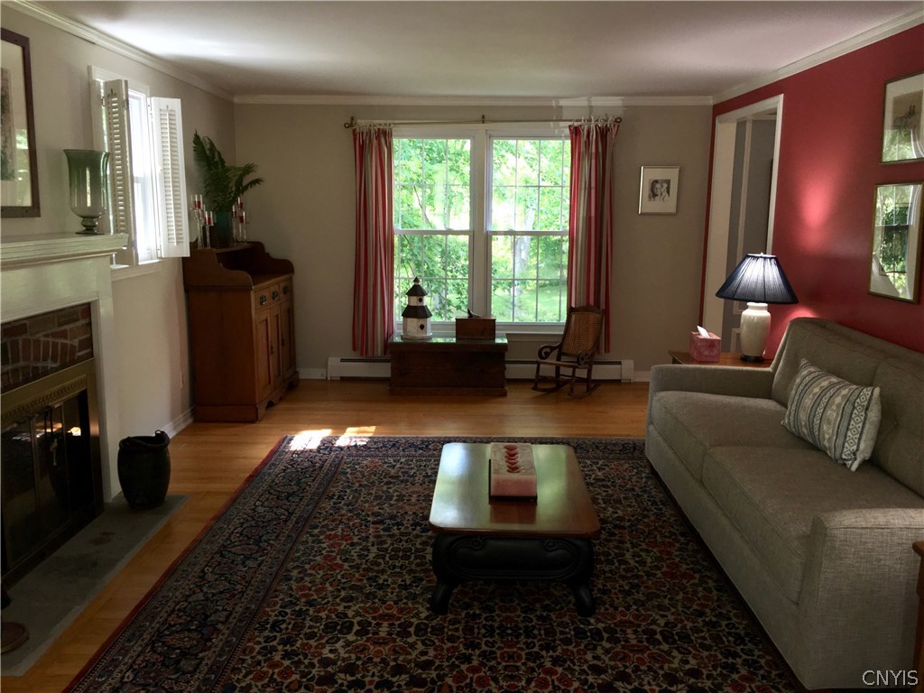 130 Pine Ridge Road Manlius, NY 13066 - Photo 8 of 35 Windows at far side of living room overlook backya