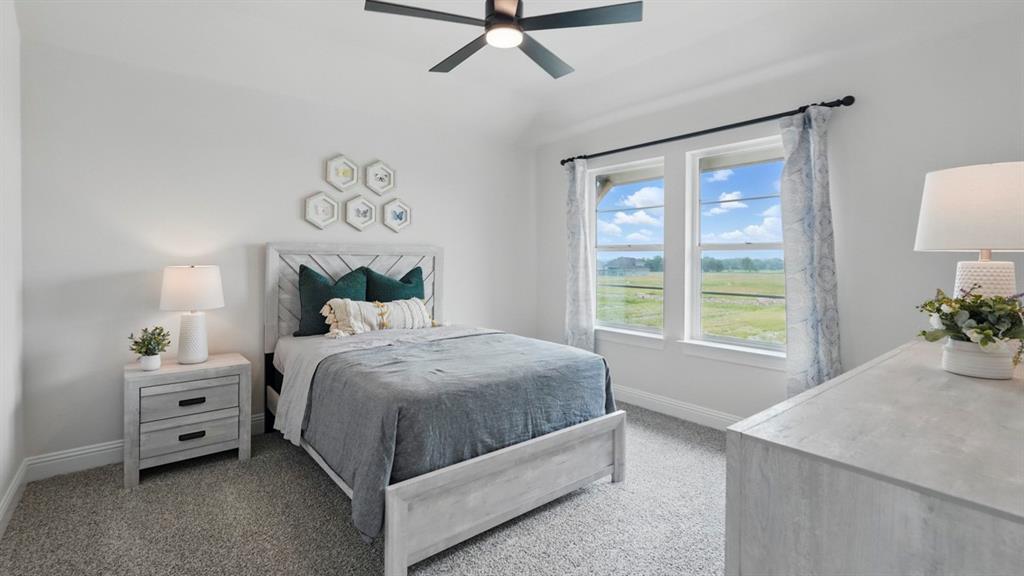 1016 Pitchfork Road Royse City, TX 75189 - Photo 24 of 35 a bedroom with a bed and a window