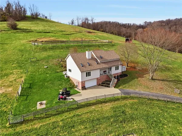 a view of a house with a big yard