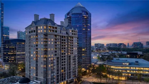 a view of a city with tall buildings