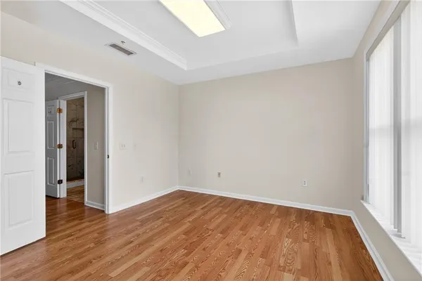 a living room with furniture and white walls