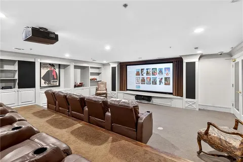 a view of a backyard with sitting area