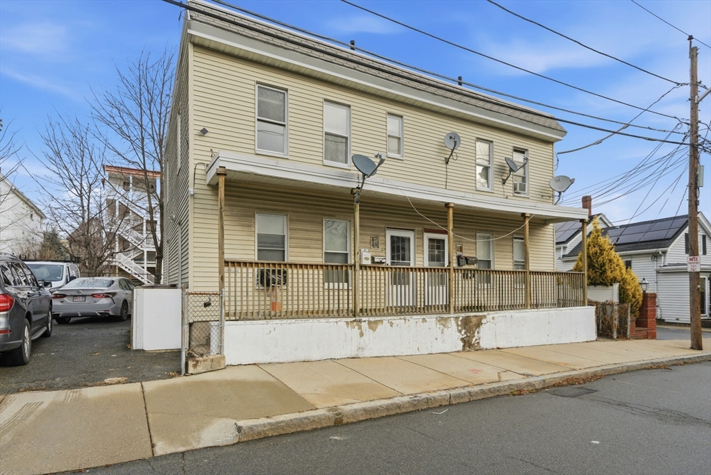 29-31 Auburn Street, Unit 2L Everett, MA 02149 - Photo 17 of 18 a view of a building with a street