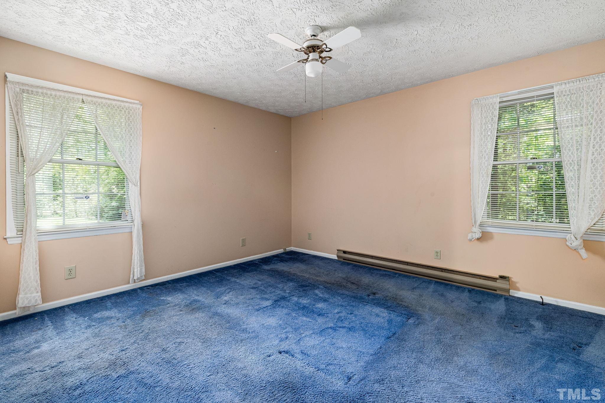 3509 Hurdle Mills Road Roxboro, NC 27574 - Photo 18 of 30 a view of an empty room with a window