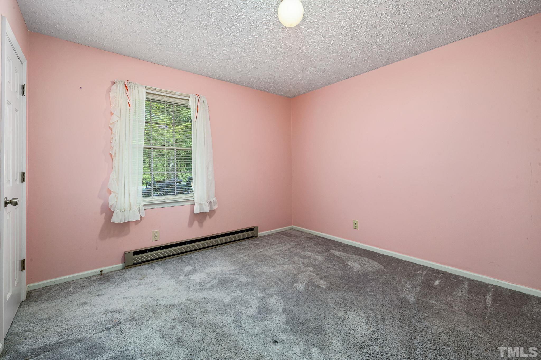 3509 Hurdle Mills Road Roxboro, NC 27574 - Photo 22 of 30 an empty room with windows