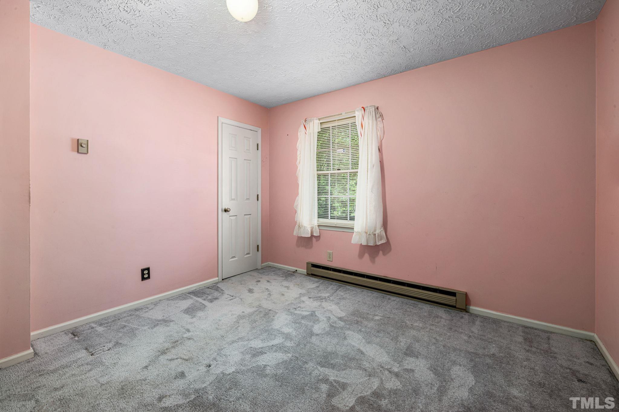3509 Hurdle Mills Road Roxboro, NC 27574 - Photo 23 of 30 a view of room with window